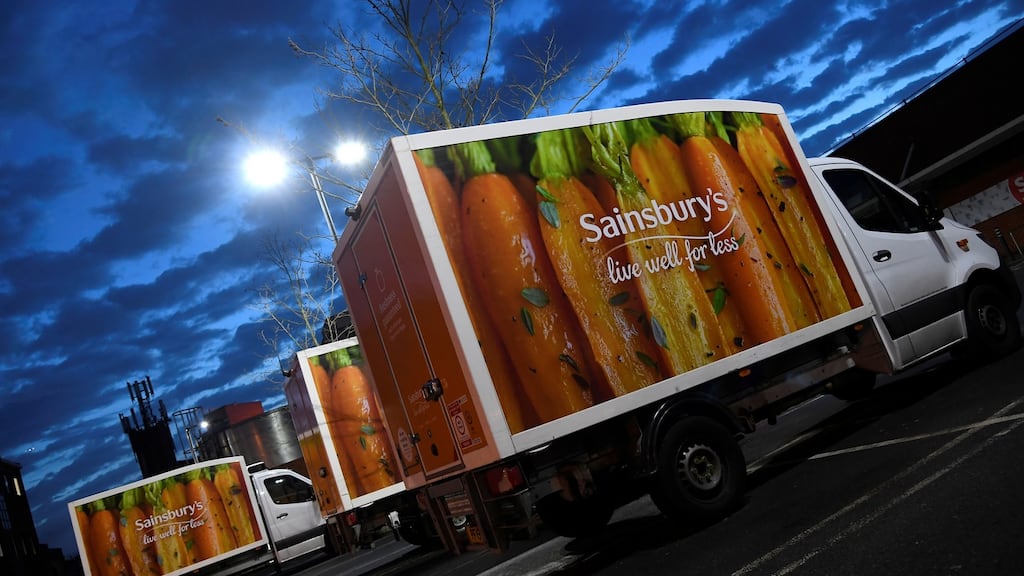 Signage for Sainsbury’s is seen on delivery vans at a branch of the supermarket in London. Photograph: Toby Melville/Reuters