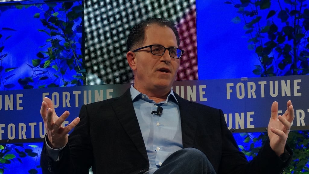 Michael Dell said new technology innovations could bring the possibility of eradicating deafness, blindness and paralysis. Photograph: AFP