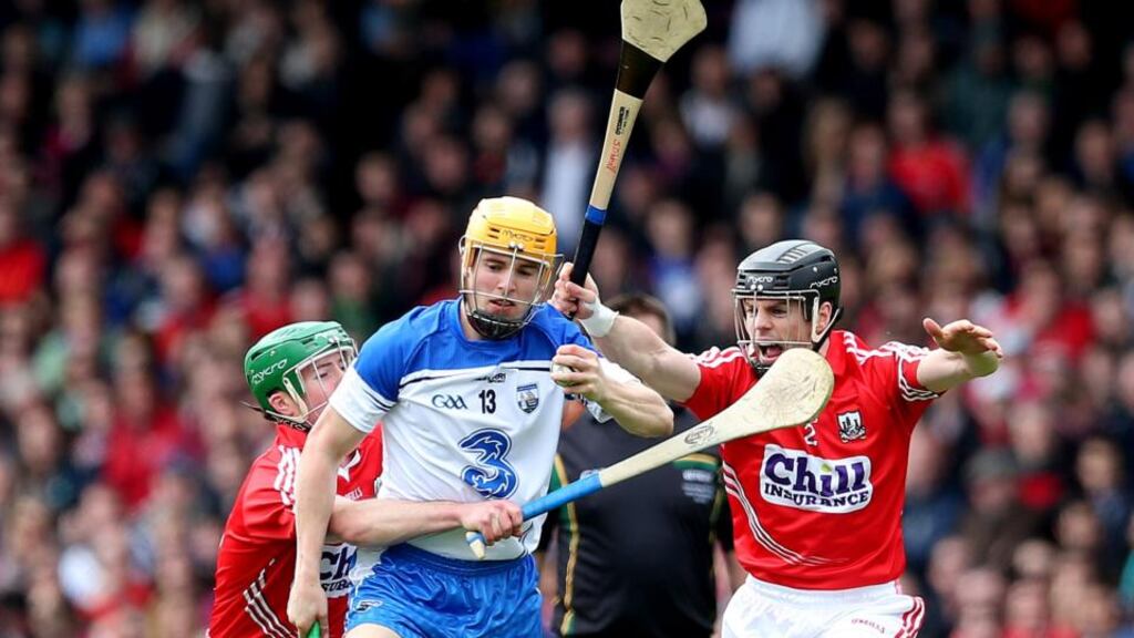 Cork’s Daniel Kearney and Shane O’Neill put pressure on Waterford’s Brian O’Sullivan during Sunday’s Munster quarter-final at Semple Stadium. Photograph: Inpho