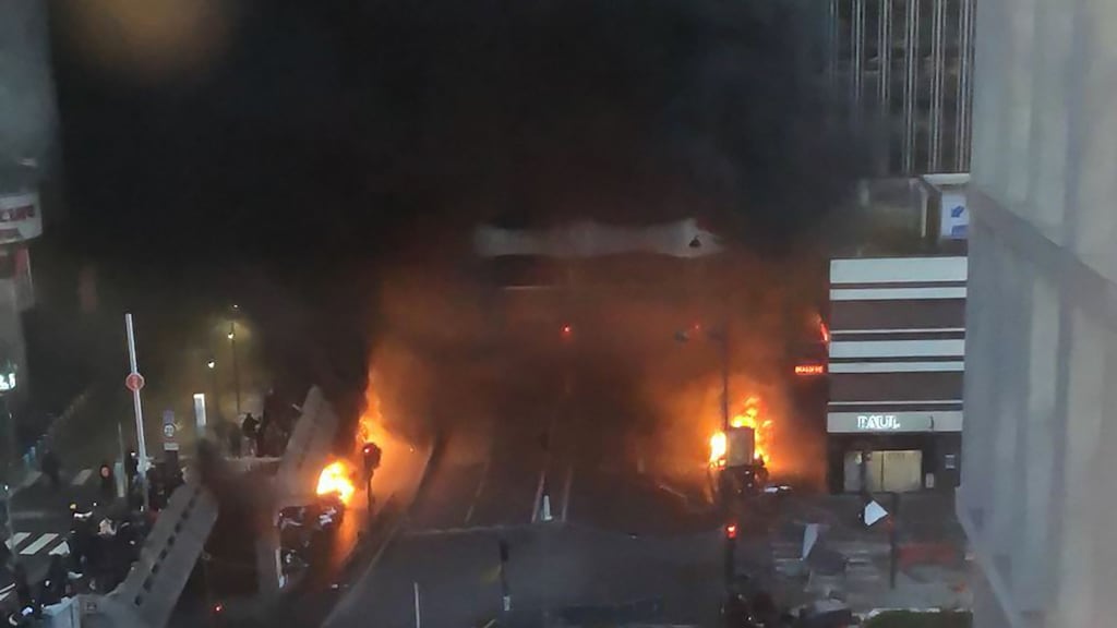 Vehicles and bins on fire in a sidestreet to the Gare de Lyon railway station in Paris. Photograph: Getty