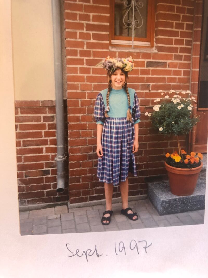 A family photo of Sophie as a child