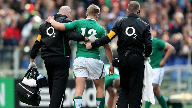 Luke Marshall leaving the field injured in Rome. Photograph: James Crombie/Inpho