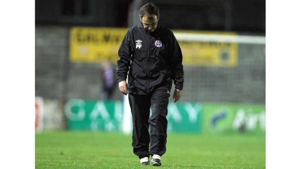 Bohemians manager Pat Fenlon cuts a dejected figure at the final whistle after losing 3-2 to Galway United at Terryland Park (Photograph: James Crombie/Inpho)