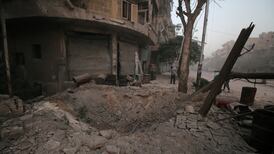 Aleppo children return to school as air strikes  continue