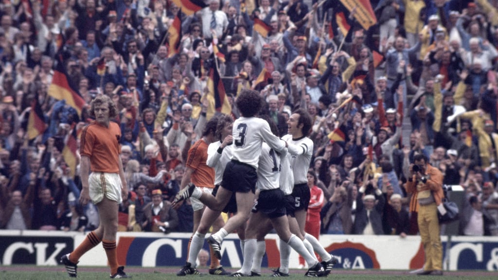 Gerd Muller (hidden) is surrounded by his team-mates after scoring the winning goal for West Germany against the Netherlands during the 1974 World Cup final at the Olympic Stadium in Munich. Photograph: Paul Popper/Popperfoto/Getty Images