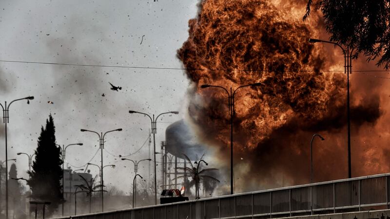 Fire and smoke billow following a car bomb explosion as Iraqi forces clash with Islamic State in Mosul. Photograph: Getty