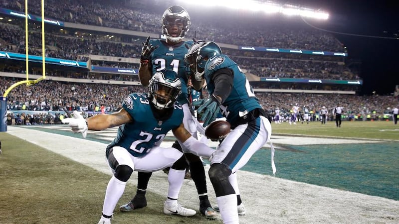Corey Grahamof the Philadelphia Eagles is congratulated by his teammates after an interception during the fourth quarter against the Minnesota Vikings in the NFC Championship game at Lincoln Financial Field in Philadelphia, Pennsylvania. Photo: Rob Carr/Getty Images