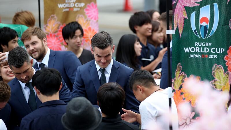 Jonathan Sexton signs autographs for fans before the official welcome ceremony. Photograph: Dan Sheridan/Inpho