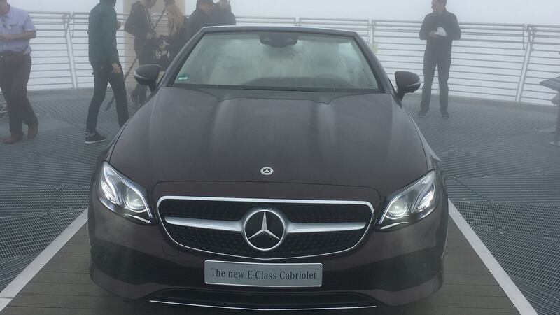 The new Mercedes-Benz E-Class convertible in the clouds on top of Mont Blanc