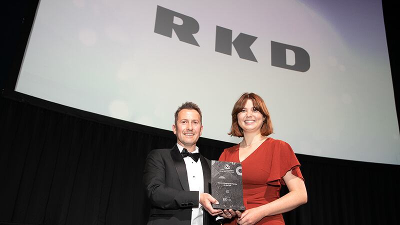 Stephen Pierce, Irish Sales Agent, Ezoboard Ireland, presents the Green Architectural Practice of the Year award to Rebecca O’Connor, RKD.