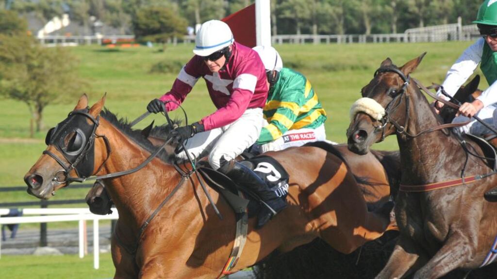 Rouge Angel ridden by David Mullins (left) jumps the last to win the Galway Blazers Handicap Chase. Photograph: PA Wire