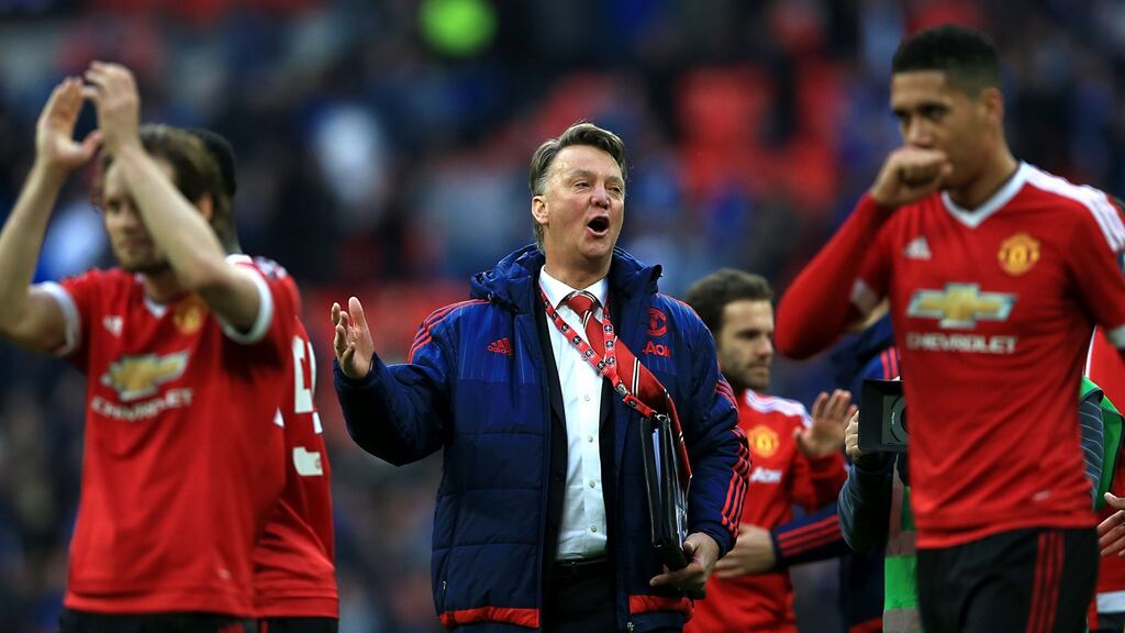 Manchester United manager Louis van Gaal celebrates after the final whistle of the FA Cup win over Everton at Wembley. Photograph: John Walton/PA