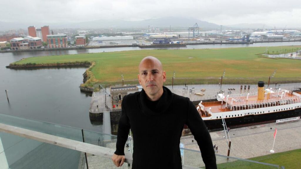 Jorge Rodríguez-Gerada at the site in Belfast’s Titanic Quarter where he is working with volunteers and communities from Belfast to create a giant portrait of a Belfast girl. Photograph: Press Eye Photography