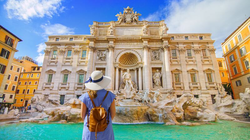 Make a wish at the Trevi Fountain in Rome