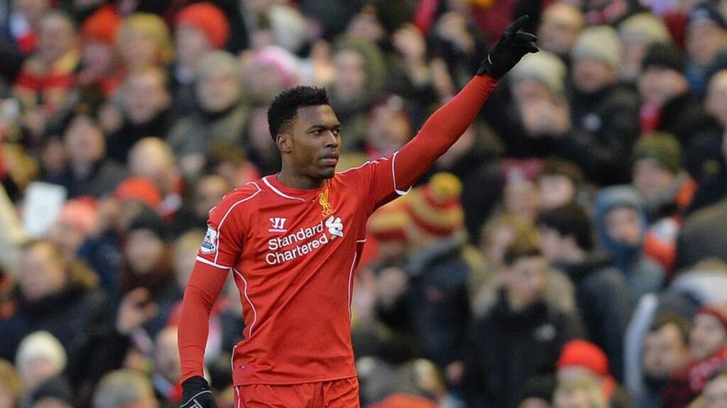 Liverpool’s Daniel Sturridge celebrates scoring the second goal making the score 2-0 during the English Premier League soccer match between Liverpool and West Ham at the Anfield in Liverpool. Photograph: Peter Powell/EPA