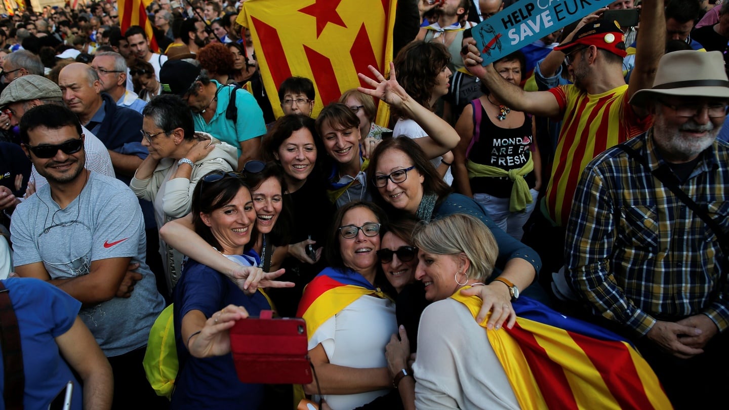 People celebrate in front of the Catalan regional government headquarters after the regional parliament declared independence from Spain in Barcelona. Photograph: John Nazca/Reuters
