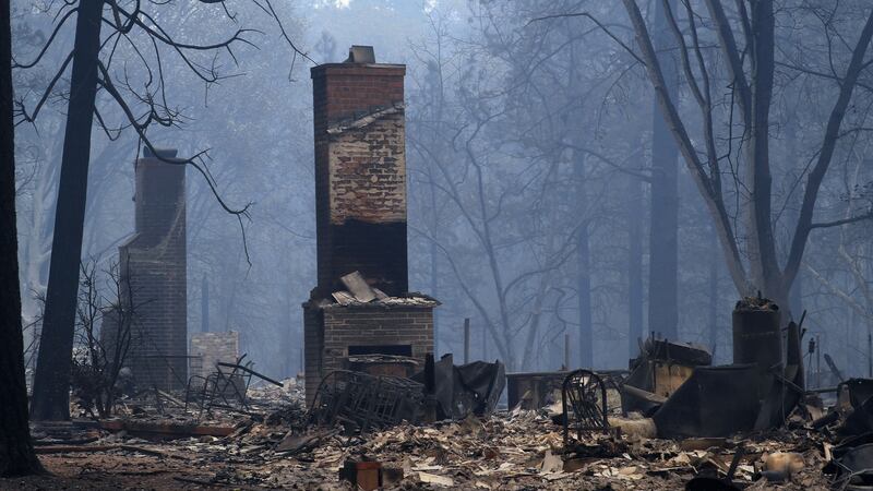 Chimneys were all that remained of some residences gutted by fire in Paradise, California. Photograph: Jim Wilson/The New York Times