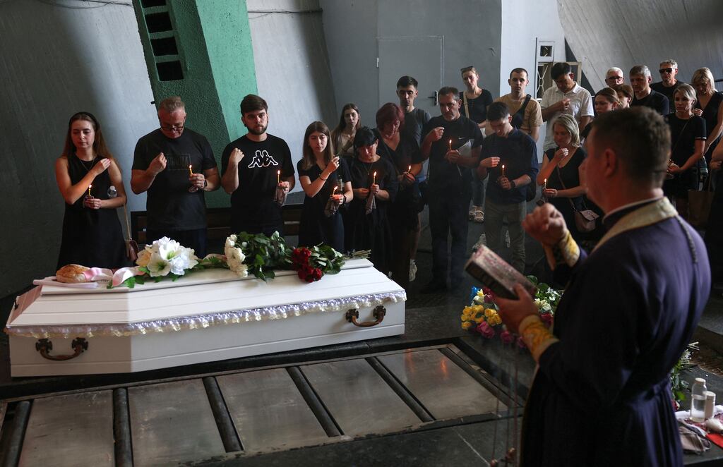 People attend the funeral ceremony for the senior nurse of the Adonis medical clinic, Tetyana Sharova, who was killed during a missile attack, in Kyiv, on July 11th. Photograph: Anatolii Stepanov/AFP/Getty Images