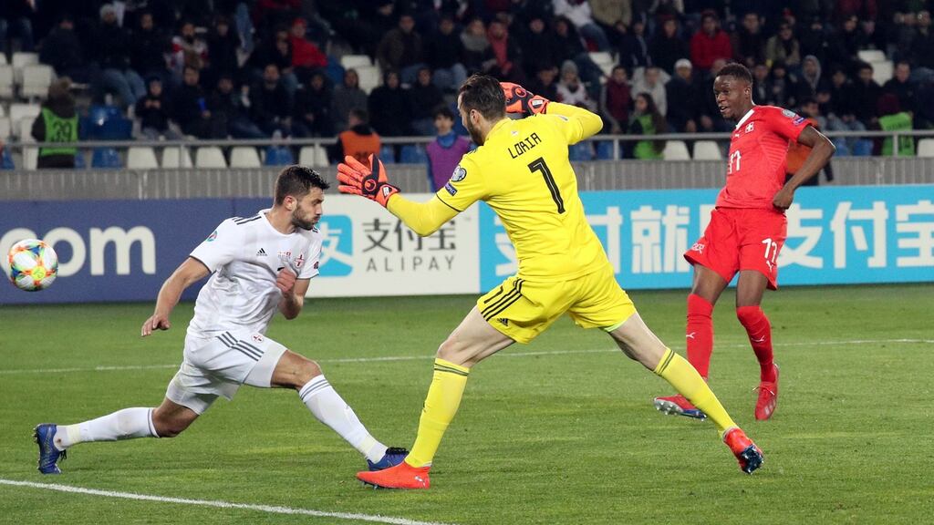 Switzerland’s Denis Zakaria scores their second goal. Photograph: Irakli Gedenidze/Reuters