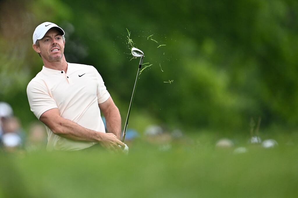 Rory McIlroy of Northern Ireland watches his approach to the 17th green. Photograph: Minas Panagiotakis/Getty