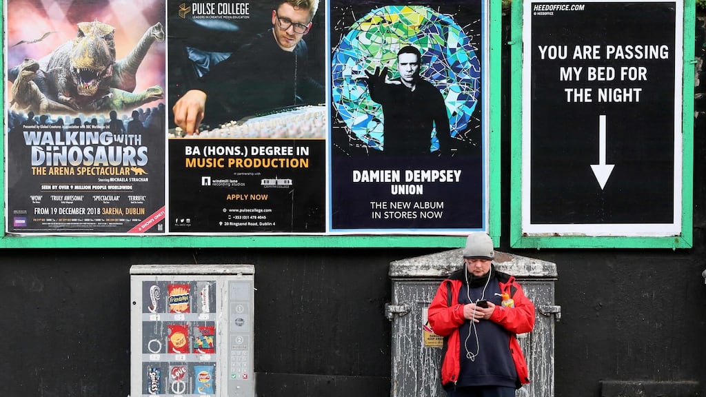 A poster highlighting homelessness in Dublin city centre in December. Photograph: Paul Faith/AFP/Getty Images