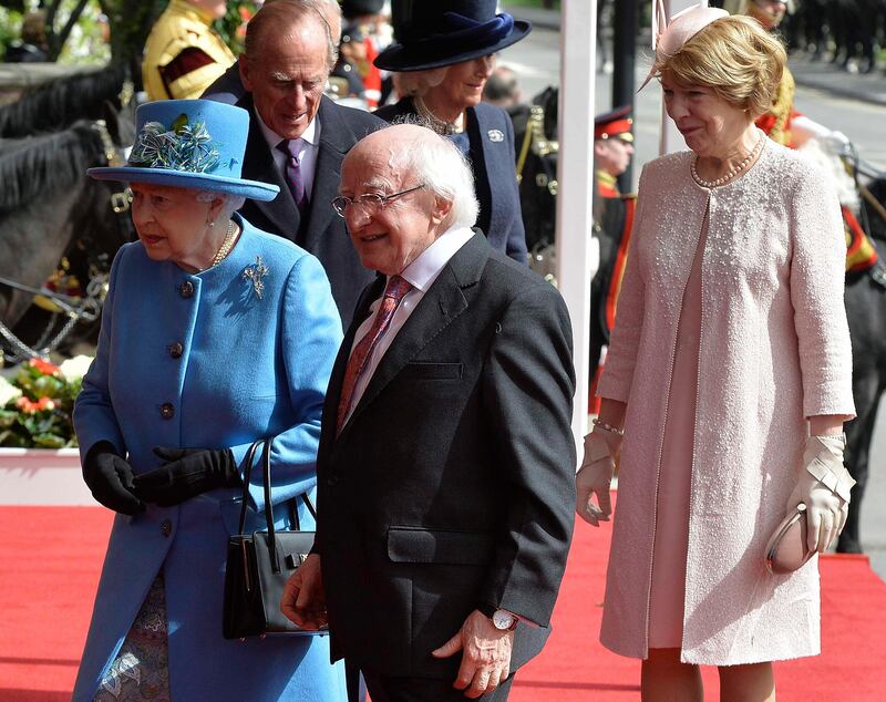 President Michael D Higgins with Queen Elizabeth and his wife Sabina at Windsor Castle during a State visit to Britain in 2014. Photograph: Toby Melville/Reuters