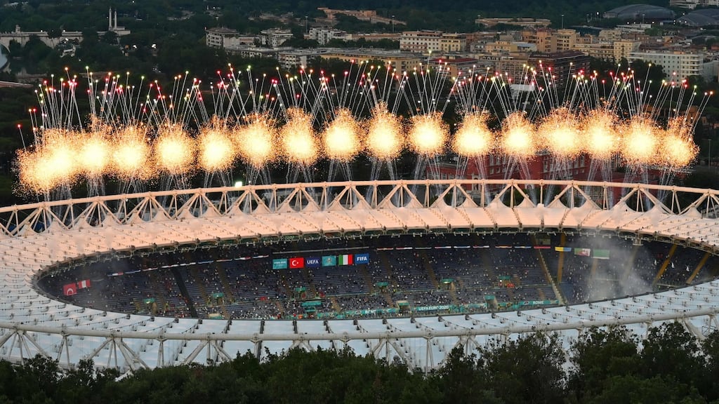 Fireworks over the Olympic stadium in Rome as part of the European Football Championship’s opening ceremony, prior to the competition’s kick off Turkey vs Italy. Photograph: Alberto PIZZOLI / AFP
