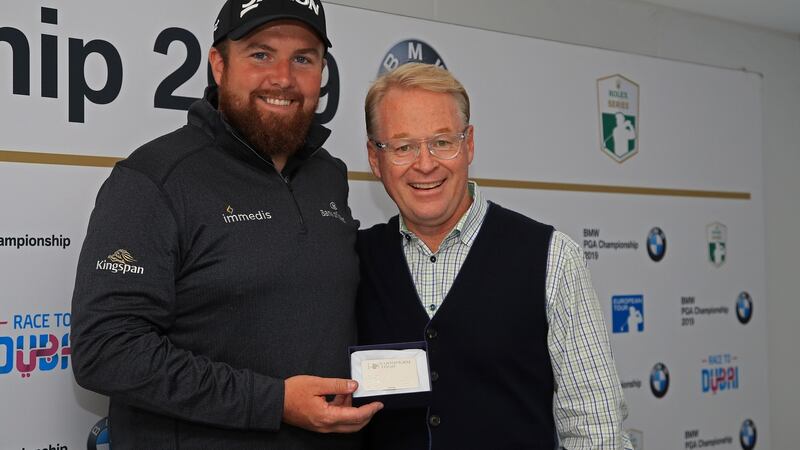 Shane Lowry is presented with Honorary Life Membership of The European Tour by Keith Pelley. Photo: Andrew Redington/Getty Images