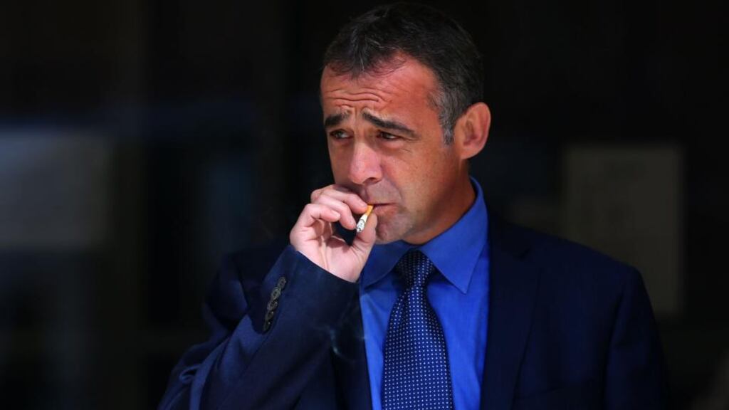 Coronation Street actor Michael Le Vell smokes a cigarette outside Manchester Crown Court . Photograph: Dave Thompson/PA Wire