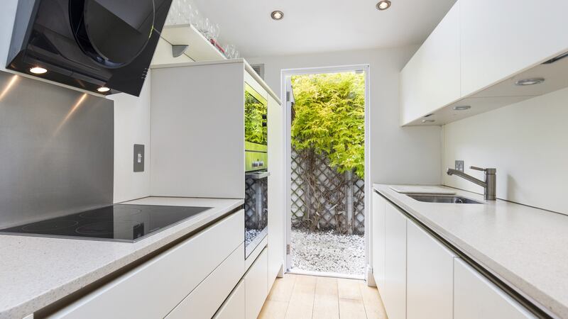 The kitchen is from Arena and has Miele and Neff appliances.