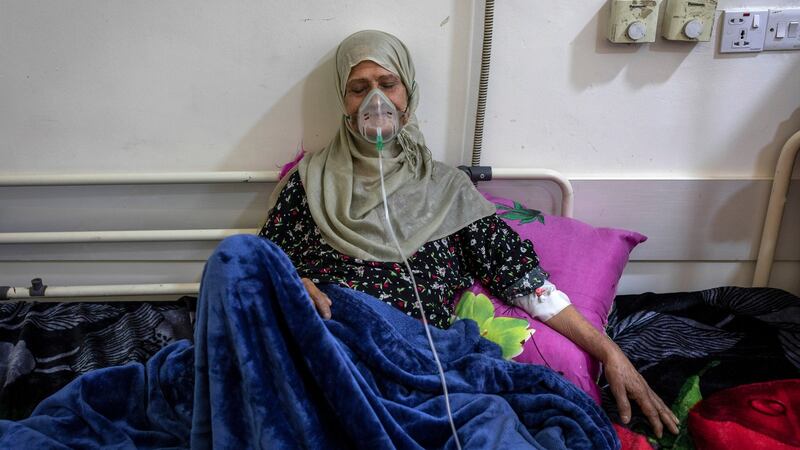 Tukhia Hachim Hashin (67) receives treatment at an overcrowded cancer hospital in Basra. Iraq burns natural gas from oil wells but also imports natural gas. Photograph: Ivor Prickett/New York Times