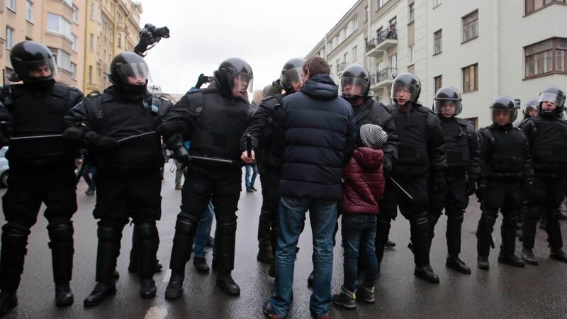 Riot policemen stand guard during a rally held by supporters of Russian opposition leader Alexei Navalny. Photograph: Reuters
