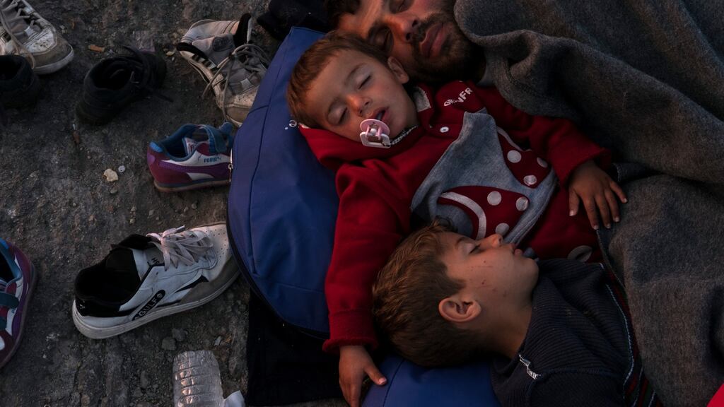 Migrants stranded at the Greek port of Chios. “Our fullest identity is found in our being children of God, an identity we share with everyone on this planet.” Photograph: Tyler Hicks/The New York Times