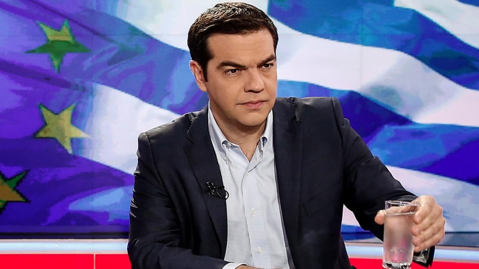 Greek prime minister Alexis Tsipras prepares for a televised interview on Monday. Photograph: Bloomberg