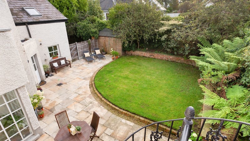 Back garden with stairs from terrace