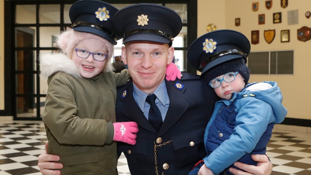 Graduating at the Garda College in Templemore was Garda Michael O’Grady, Newmarket on Fergus, Clare with his children Caitlin(6) and Darragh (3). Photograph: Liam Burke/Press 22