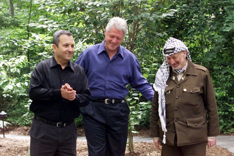 Israeli prime minister Ehud Barak, US president Bill Clinton and Palestinian leader Yasser Arafat at Camp David in July 2000. Photograph: Paul Hosefros/New York Times