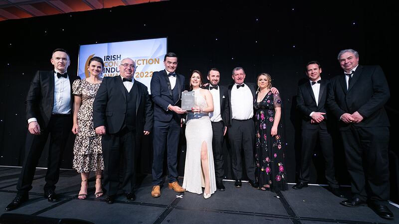 Brendan Crealey, managing director, ITS, presents the Excellence in Health & Safety award to the ADCO Contracting team.