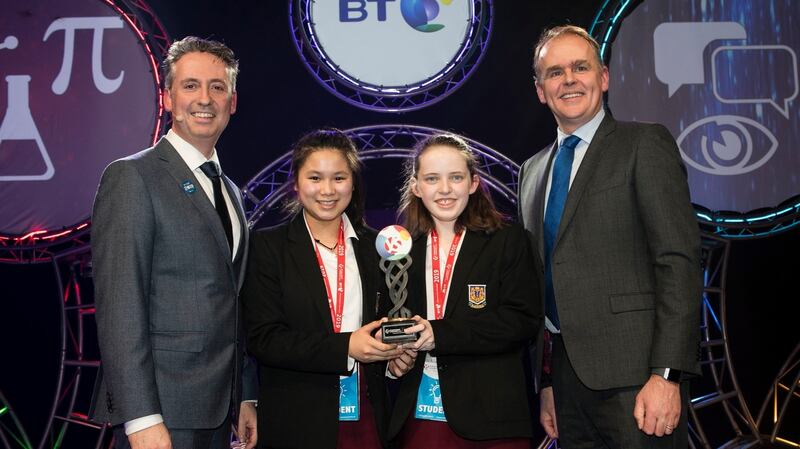 Best group award winners Aoife Morris and Tianha Williams, St Aloysius College Carrigtwohill Co Cork, flanked by managing director BT Ireland Shay Walsh (left) and Minister for Education and Skills Joe McHugh. Photograph: Chris Bellew/Fennell Photography