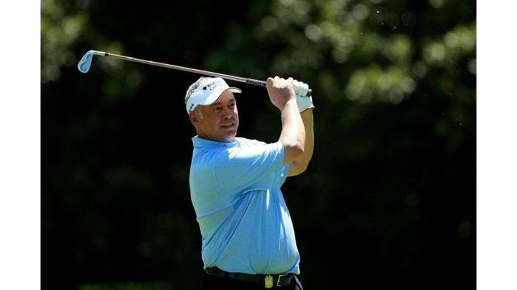 Darren Clarke of Northern Ireland plays his second shot into the 14th during the first round of the Africa Open at East London Golf Club (Photograph: Warren Little/Getty Images)
