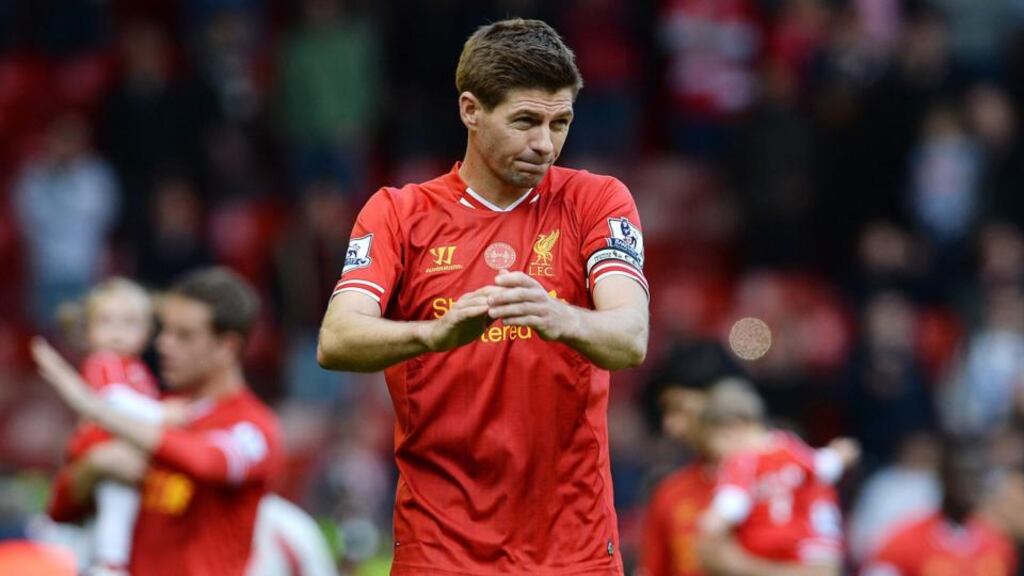 Liverpool’s Steven Gerrard reacts to the crowd during the lap of honour after the English Premier League match between Liverpool and Newcastle United at Anfield Road. Photograph: EPA.