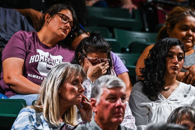 Locals attend the vigil for the victims of the mass shooting at Robb Elementary School in Uvalde, Texas