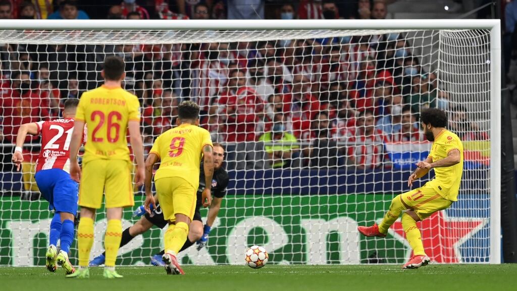 Liverpool’s Mohamed Salah scores his side’s third goal during the Champions League win over Atlético Madrid. Photo: David Ramos/Getty Images