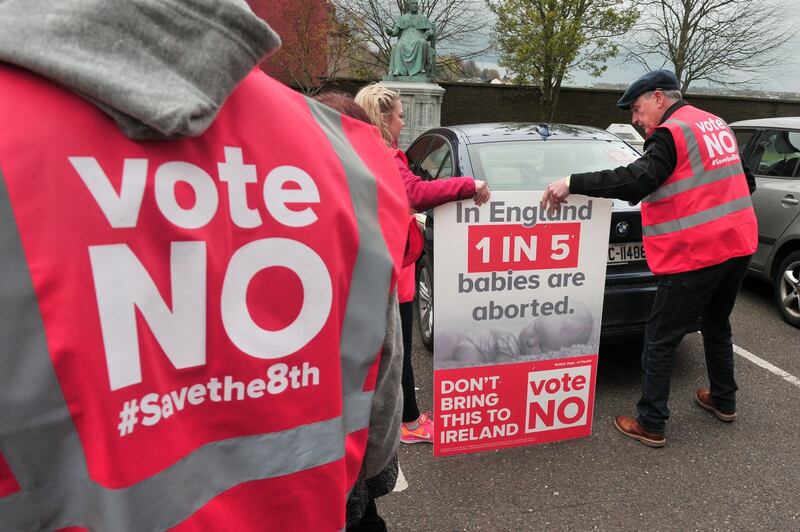 Eighth Amendment: Joe Walsh (right) and fellow Save the 8th canvassers. Photograph: Daragh Mc Sweeney/Provision