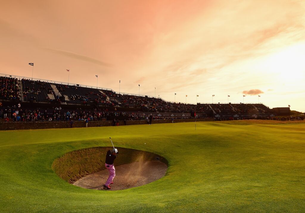 Tadahiro Takayama of the US hitting his third shot from a bunker during his second round of the 144th Open Championship in 2015 at the Old Course in St Andrews. Photograph: David Cannon/R&A/R&A via Getty Images