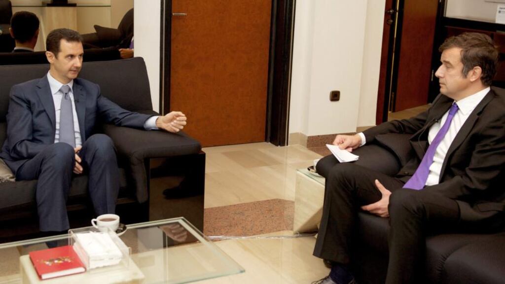 A handout picture made available  by the Syrian Arab News Agency  shows Syria’s president, Bashar al-Assad speaking during an interview with French magazine Paris Match, in Damascus. Assad spoke scathingly of France, portraying the last two French presidents as puppets of Qatar and Washington. Photograph: EPA/Sana