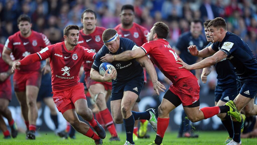 Sean Cronin of Leinster makes a break past Zack Holmes of Toulouse to score his side’s third try during the Champions Cup loss. Photo: Dan Mullan/Getty Images