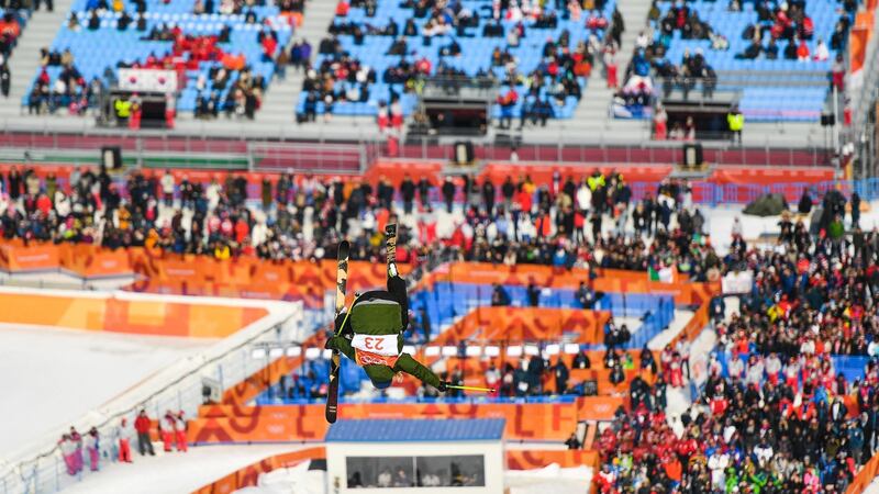 Newby performs a flip. Photo: Ramsey Cardy/Sportsfile