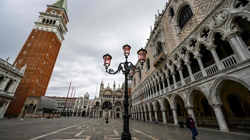 A person walks in St Mark’s Square in Venice on May 13th. Photograph: Vincenzo Pinto/AFP via Getty Images