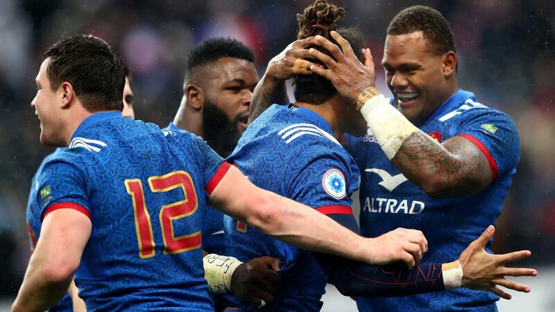France’s Teddy Thomas celebrates scoring their try with teammates. Photograph: James Crombie/Inpho